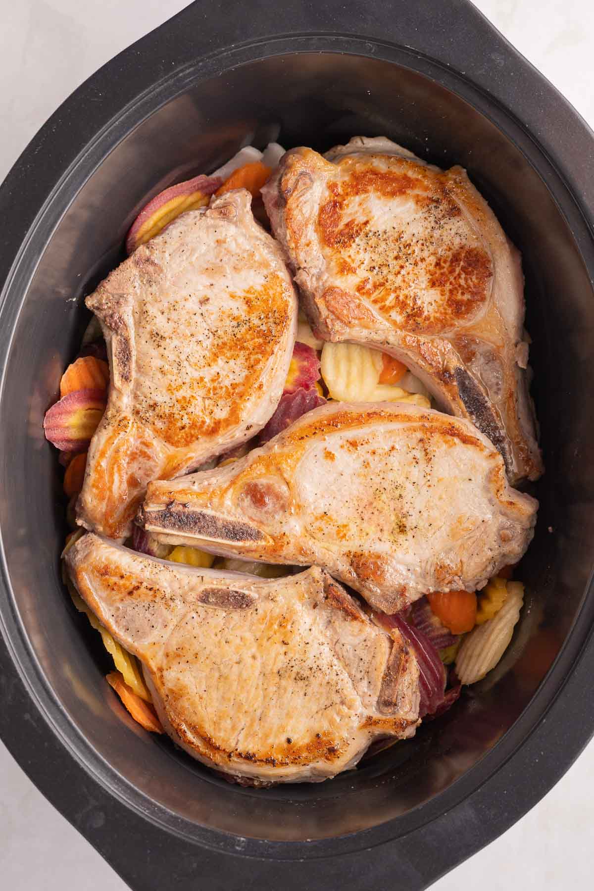 Easy Crock Pot Pork Chops and Sauerkraut Recipe for Dinner